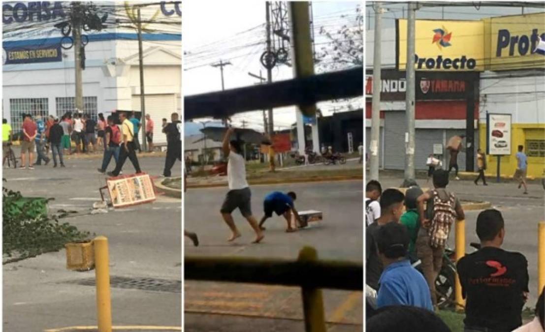 Un grupo de encapuchados saqueó una tienda y bloqueó el bulevar salida a La Lima la tarde de este martes en San Pedro Sula, zona norte de Honduras.