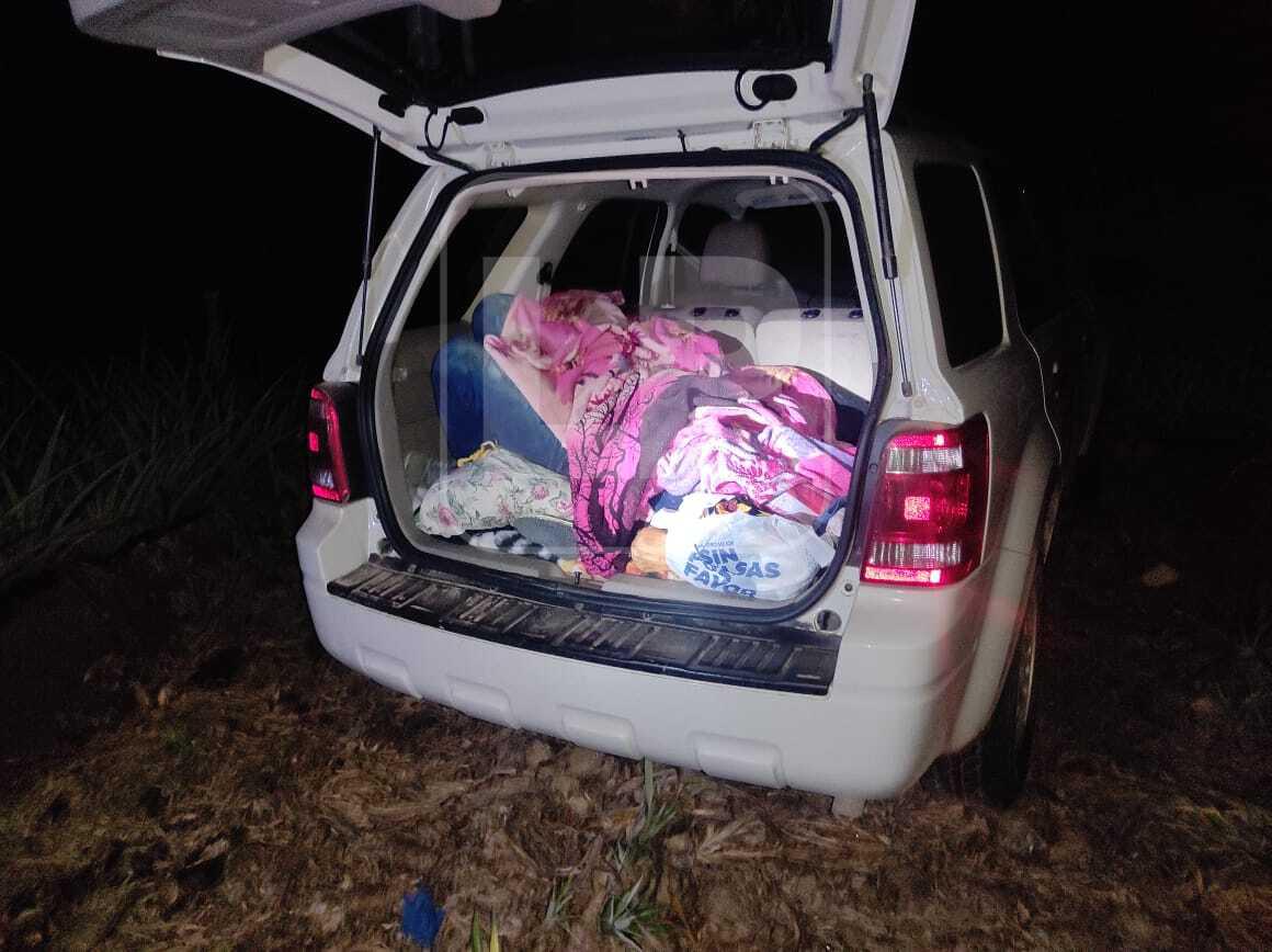 Baúl del vehículo, en donde fue encontrada asesinada una pareja en El Porvenir, Atlántida.