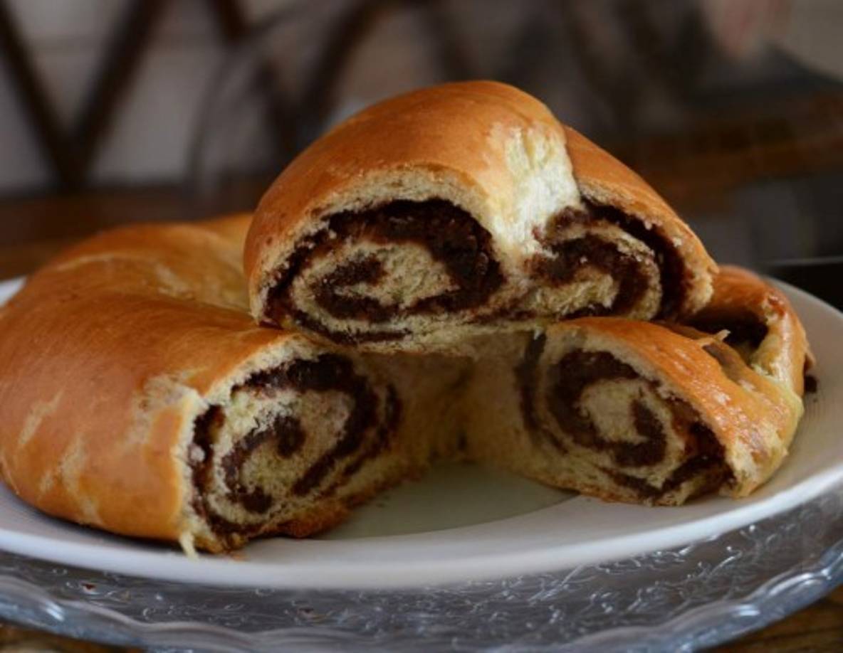 'Putizza' es un bizcocho enrollado que se sirve con crema de leche. Su alto contenido de mantequilla y azúcar, sin embargo, permite una comparación con la italiana pizza, que también tiene muchas calorías.