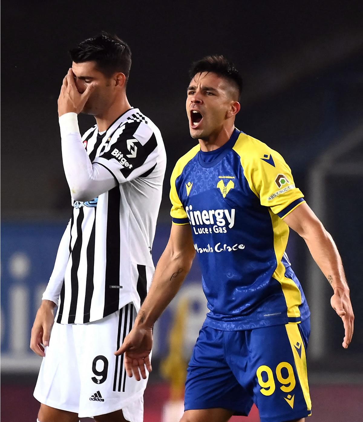 El ‘Cholito‘ Simeone gritando uno de sus goles ante el lamento de Álvaro Morata.