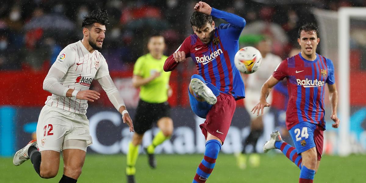 El Barça cierra el año con un empate ante Sevilla en intenso partido bajo la lluvia