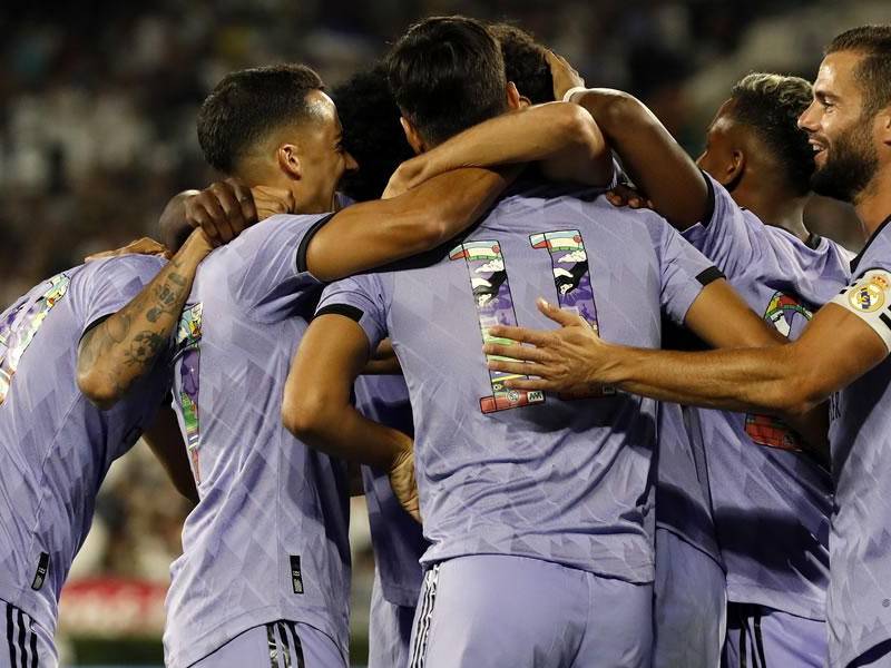 La celebración de los jugadores del Real Madrid tras el gol de Marco Asensio contra la Juventus.