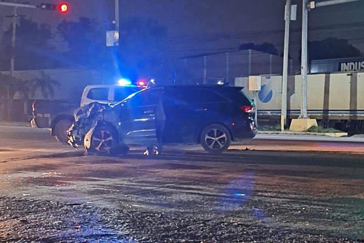 Una patrulla de la Policía en el lugar del accidente.