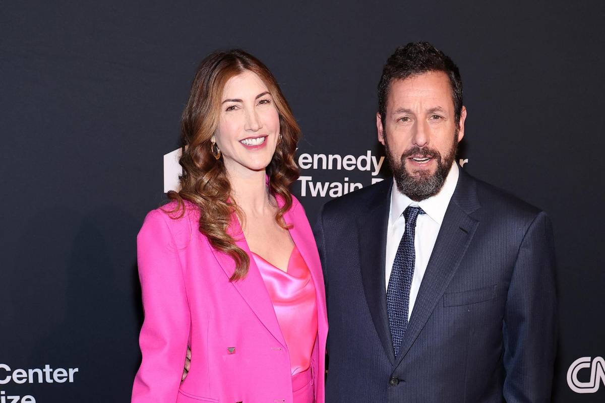 El actor junto a su esposa Jackie Sandler.
