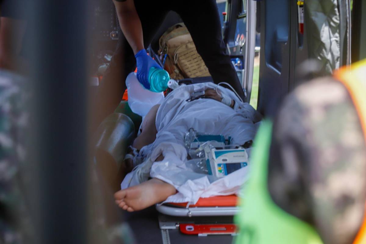 Llegan en helicóptero a SPS las víctimas del accidente en Los Hornos, Copán