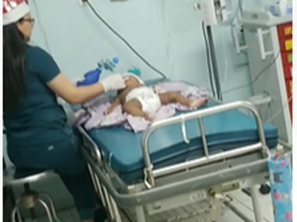 Muere un niño de 7 meses por una bala perdida en La Ceiba