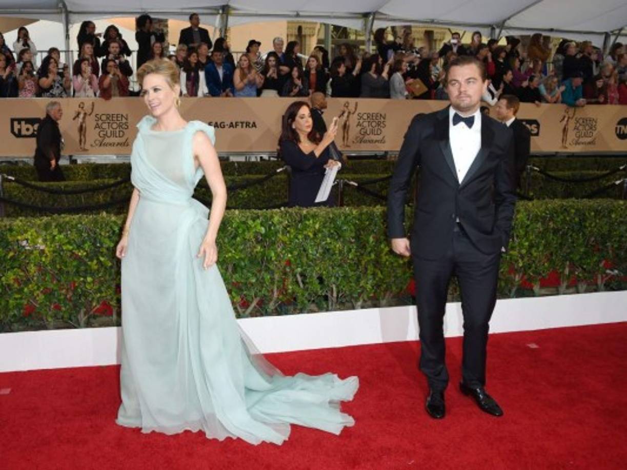 January Jones y Leonardo DiCaprio.