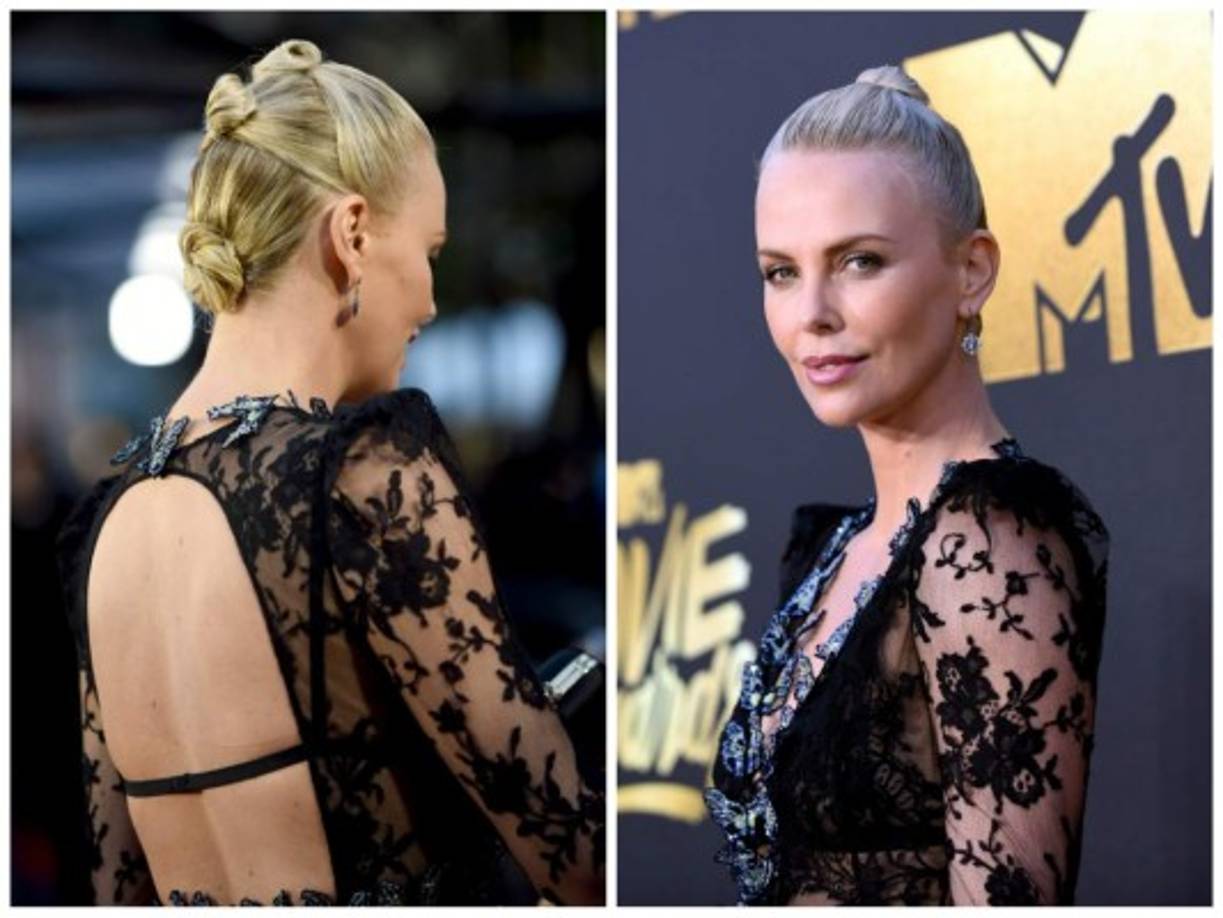 Charlize Theron llevabó un vestido de encaje bordado de mariposa de Alexander McQueen.
