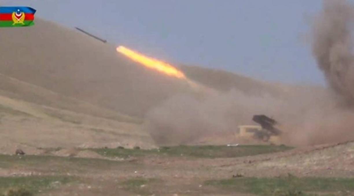 An image grab taken from a video made available on the official web site of the Azerbaijani Defence Ministry on September 28, 2020, allegedly shows Azeri troops conducting a combat operation during clashes between Armenian separatists and Azerbaijan in the breakaway region of Nagorno-Karabakh. (Photo by Handout / Azerbaijani Defence Ministry / AFP) / RESTRICTED TO EDITORIAL USE - MANDATORY CREDIT 'AFP PHOTO / Azerbaijani Defence Ministry' - NO MARKETING NO ADVERTISING CAMPAIGNS - DISTRIBUTED AS A SERVICE TO CLIENTS --- NO ARCHIVE ---