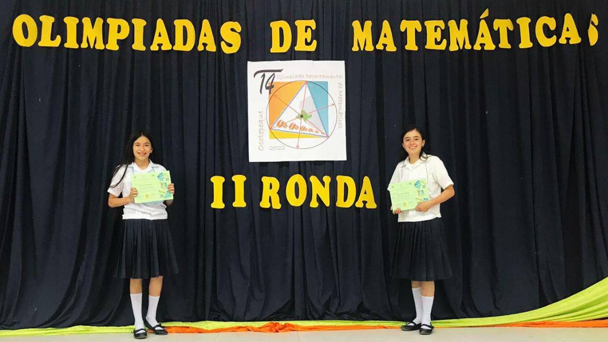 <b>“En las olimpiadas no hay ejercicios mecánicos, le permiten al estudiante desarrollar sus capacidades”, afirmó Diana María Fuentez (izq.). En esa ocasión Dulce María (der.) quedó en el segundo lugar departamental y Diana en el décima, no obstante pasaron la primera ronda.</b>