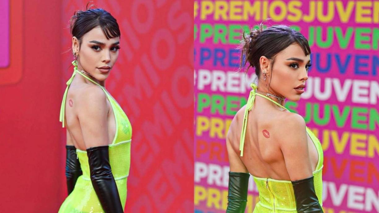 La mexicana asistió a la ceremonia con un vestido amarillo fluorecente y de transparencias. La artista también lució unos guantes negros de cuero. 