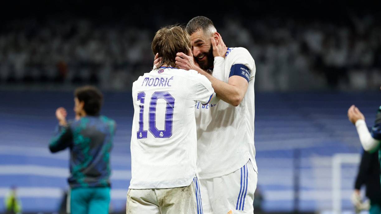 La cara de felicidad de Benzema celebrando con Modric.