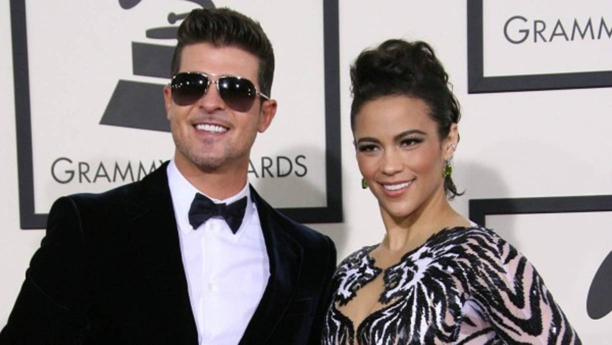 10. Ex de Robin Thicke lo acusa de violencia<br/><br/>En medio de un agitado proceso de divorcio, en enero de este año el cantante fue acusado de violencia conyugal por su exesposa, la actriz Paula Patton, y por abusar de su autoridad con su hijo.<br/><br/>Paula también habló de su infidelidad y de su adicción a las drogas, por lo que la corte emitió una orden que le impide al cantante acercarse a ella y a su hijo Julian, de 7 años de edad. El niño, efectivamente, había confiado a un profesor que su padre lo golpeaba y Paula lo acusó de llevárselo a la fuerza de su casa. Los dos esposos se separaron en 2014, después de que Thicke admitiera haber tenido varias relaciones extra conyugales.