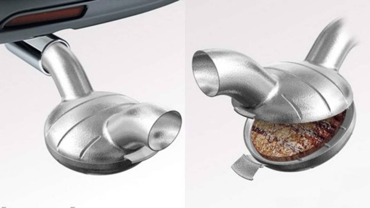 PARRILLA DE HAMBURGUESAS PARA EL ESCAPE.<br/>Y hablando de cáncer, este nunca había tenido tan buen sabor como cuando usas esta parrilla para asar hamburguesas en el tubo de escape del carro. Si, así como lo oyes, con este invento puedes cocinar mientras manejas. El fabricante asegura que ha diseñado la parrilla con un sistema que ventila los vapores del motor. Úsala bajo tu propio riesgo.