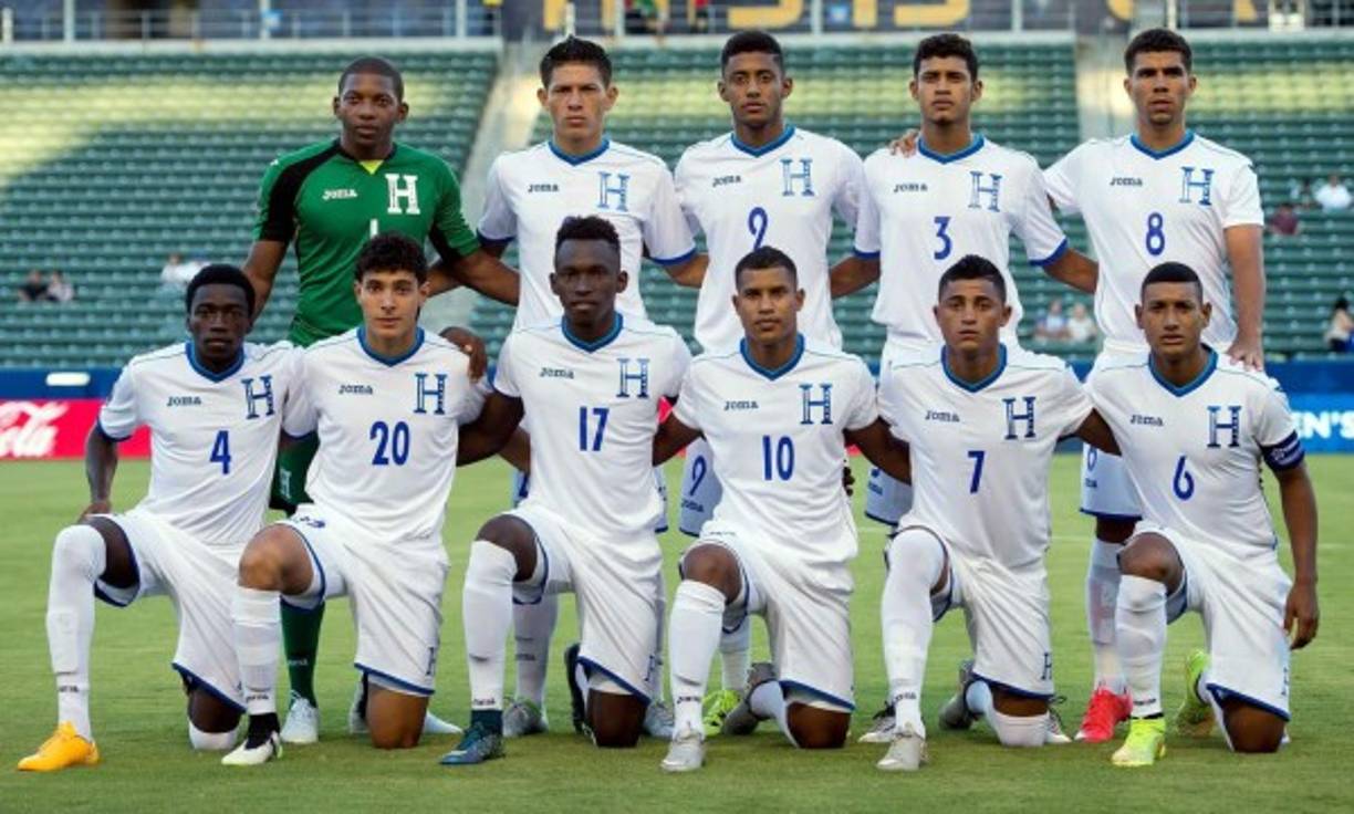El once titular con el que salió Honduras en el debut contra Haití en el Preolímpico de la Concacaf. Fotos AFP