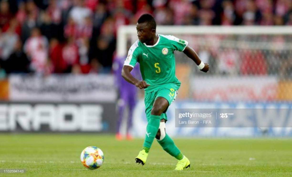 LODZ, POLAND - MAY 29: Souleymane Aw of Senegal runs with the ball during the 2019 FIFA U-20 World Cup group A match between Senegal and Poland at Lodz Stadium on May 29, 2019 in Lodz, Poland. (Photo by Lars Baron - FIFA/FIFA via Getty Images)