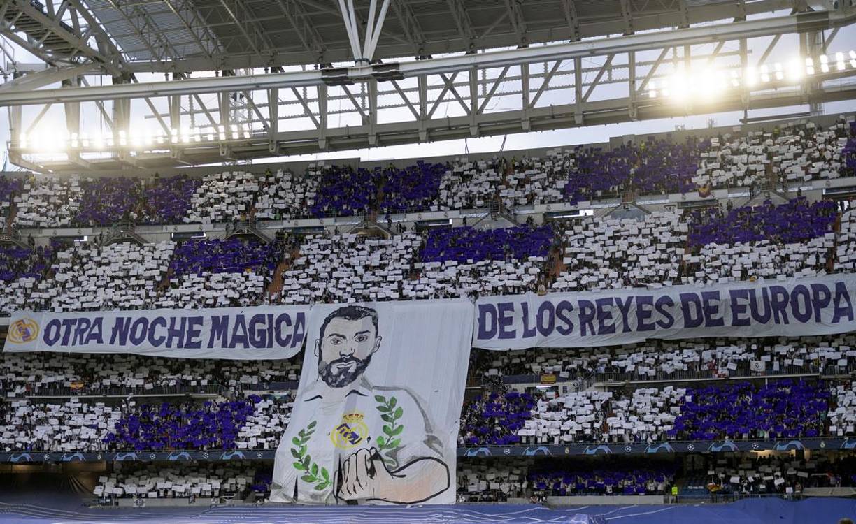 “Otra noche mágica de los reyes de Europa”. La pancarta de la afición madridista con una imagen de Benzema.