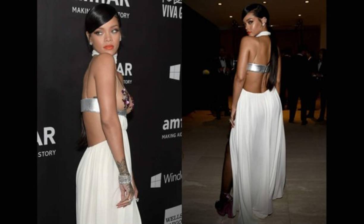 La cantante rindió su particular homenaje al anfitrión de la fiesta Tom Ford, con este vestido blanco con aberturas, sostén transparente con areolas decoradas con pedrería y falda abierta, de la colección de primavera 2015.