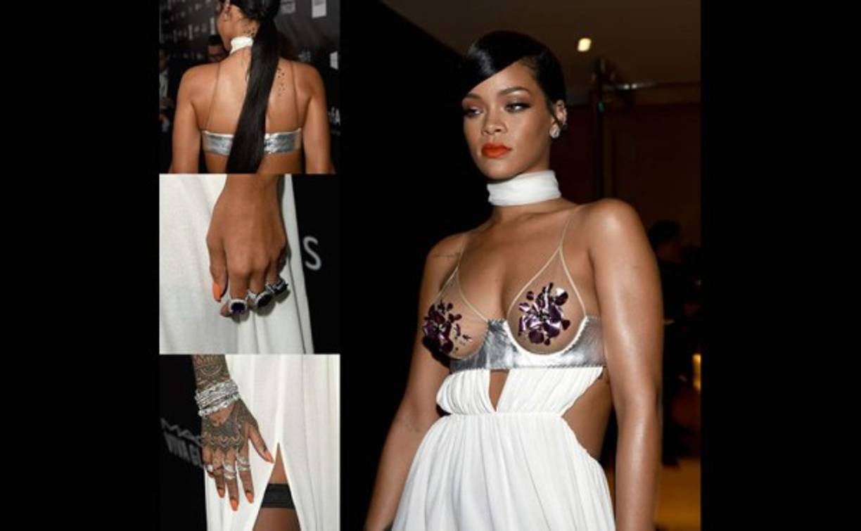 La cantante rindió su particular homenaje al anfitrión de la fiesta Tom Ford, con este vestido blanco con aberturas, sostén transparente con areolas decoradas con pedrería y falda abierta, de la colección de primavera 2015.