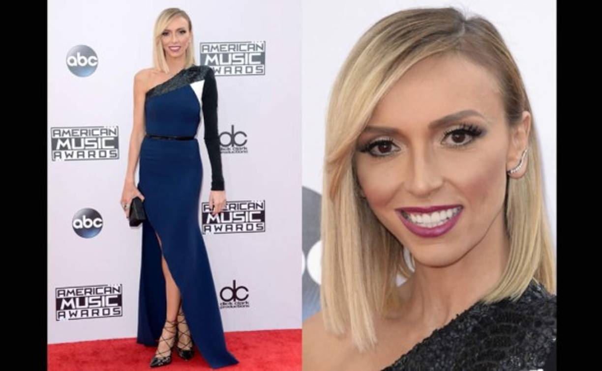 Giuliana Rancic. La presentadora de E! llegó con un bello vestido azul oscuro mezclado con negro y blanco.
