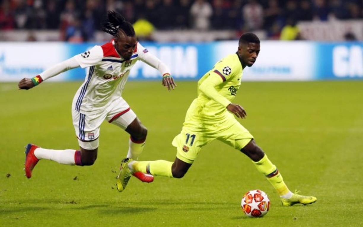 Ousmane Dembéle es perseguido por Bertrand Traore.