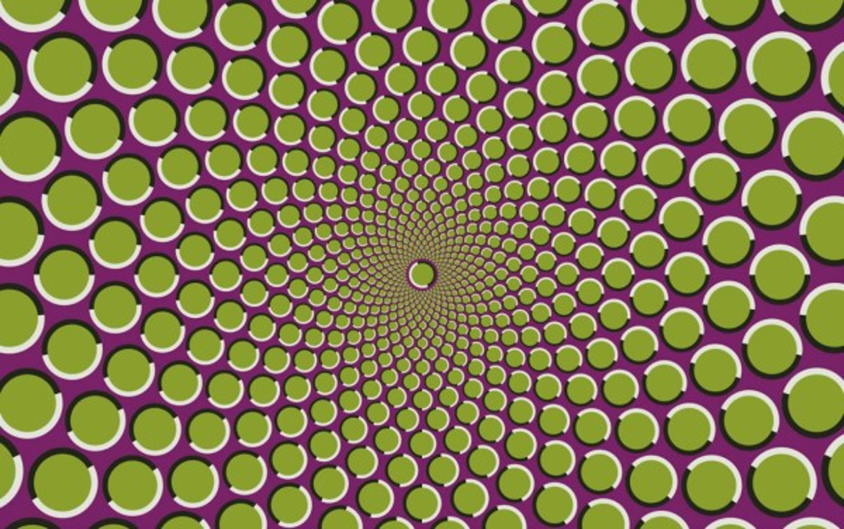 7. El movimiento ilusorio<br/><br/>Aunque sea una de las más básicas, los científicos aun no tienen claro qué produce esta ilusión. Unos sugieren que los pequeños movimientos que hacemos con la cabeza para fijar la vista en un punto hacen que los objetos contiguos parezcan moverse.<br/><br/>Otros, que al pasear la vista por la imagen, los detectores de movimiento de nuestro cerebro se confunden por tantos cambios bruscos de forma y color y detectan movimiento donde no lo hay.