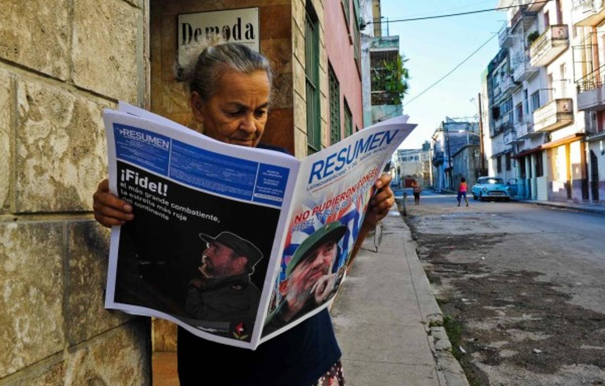Residents of San Juan, Puerto Rico, deal with damages to their homes on September 20, 2017, as Hurricane Maria batters the island. <br/>Maria slammed into Puerto Rico on Wednesday, cutting power on most of the US territory as terrified residents hunkered down in the face of the island's worst storm in living memory. After leaving a deadly trail of destruction on a string of smaller Caribbean islands, Maria made landfall on Puerto Rico's southeast coast around daybreak, packing winds of around 150mph (240kph).<br/> / AFP PHOTO / Hector RETAMAL