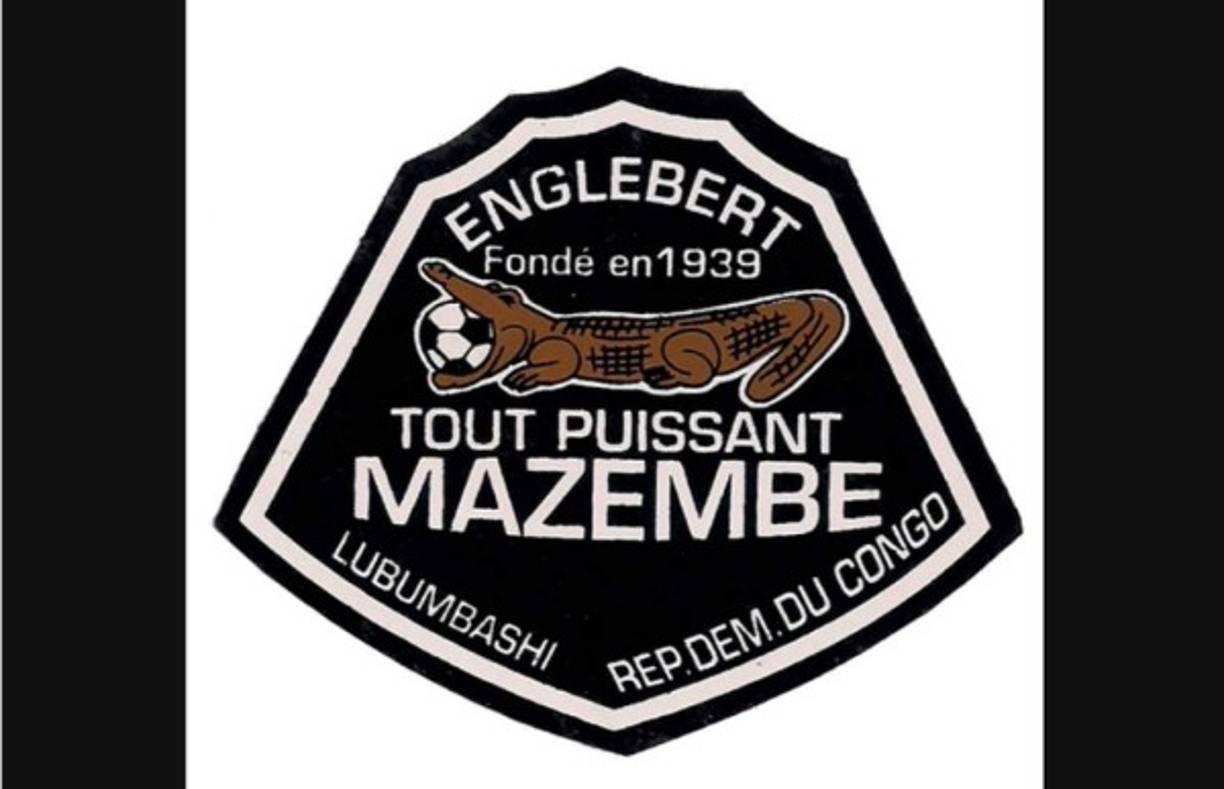 Mazembe - Este cuadro del Congo es representado por un curioso Cocodrilo que muerde un balón.