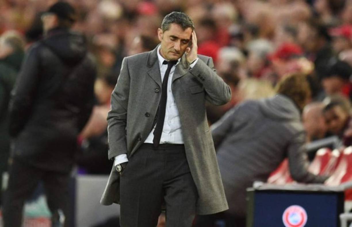 (FILES) In this file photo taken on May 07, 2019 Barcelona's Spanish coach Ernesto Valverde reacts during the UEFA Champions league semi-final second leg football match between Liverpool and Barcelona at Anfield in Liverpool, north west England on May 7, 2019. - Barcelona are set to sack their coach Ernesto Valverde, according to reports in the Spanish press. Valverde took training on January 13, 2020 but his future looks bleak, with the club expected to announce his departure following a board meeting in the afternoon at Camp Nou. (Photo by Oli SCARFF / AFP)