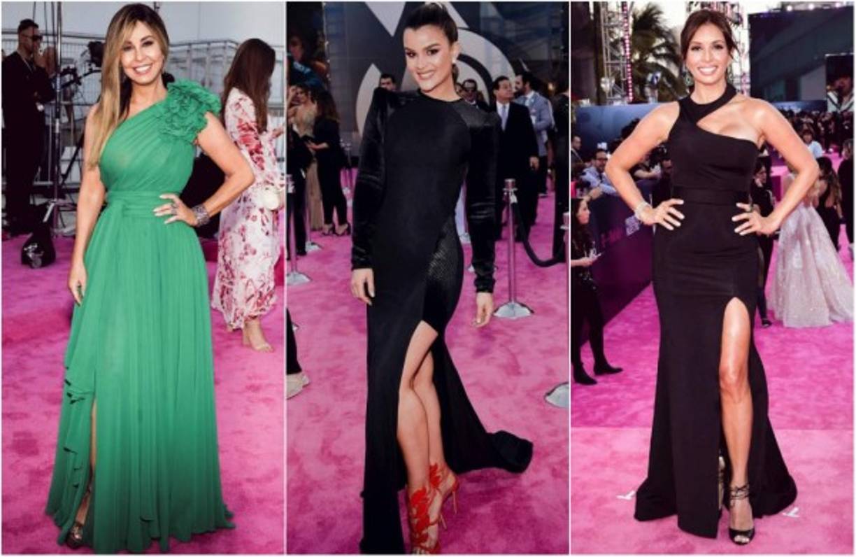 Las estrellas brillan mientras desfilan por la alfombra magenta en la 30 edición de Premio Lo Nuestro.<br/>