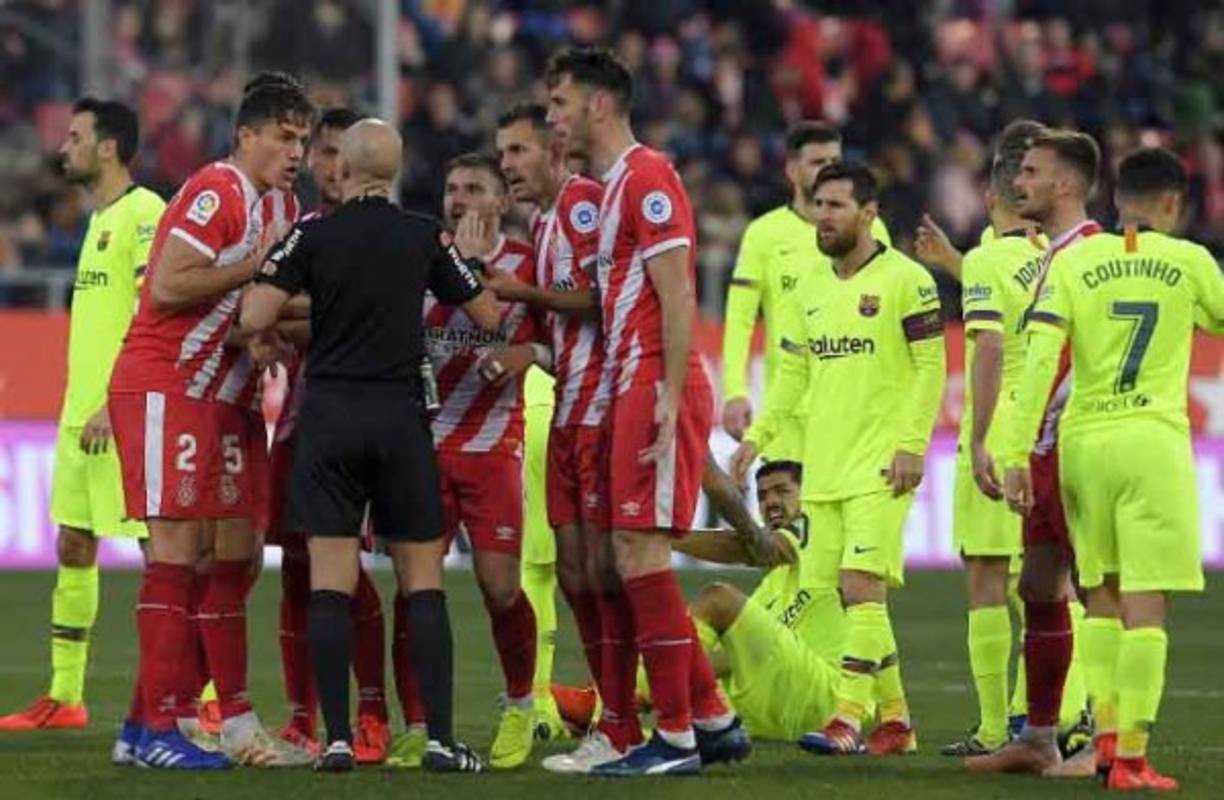 Te presentamos las imágenes más curiosas de la victoria del Barcelona de 0-2 ante Girona. El delantero hondureño Antony Lozano ingresó en el minuto 80. FOTOS AFP Y GIRONA FC.