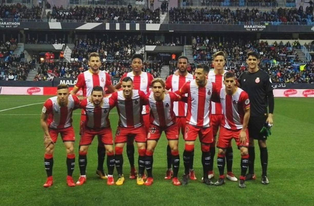 Barcelona's Uruguayan forward Luis Suarez reacts after missing a goal opportunity during the Spanish league football match between Girona FC and FC Barcelona at the Montilivi stadium in Girona on January 27, 2019. (Photo by LLUIS GENE / AFP)