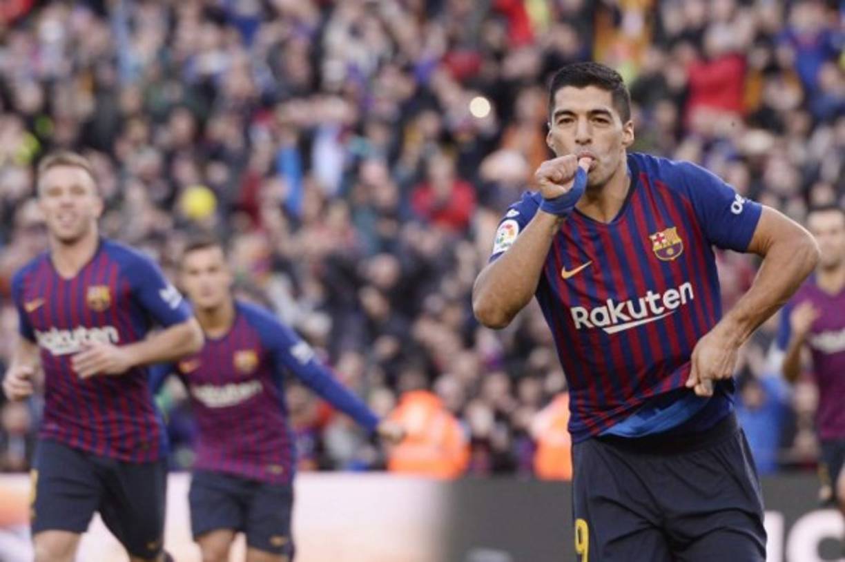 Barcelona's Spanish midfielder Ansu Fati celebrates after scoring a goal during the Spanish League football match between Barcelona and Real Madrid at the Camp Nou stadium in Barcelona on October 24, 2020. (Photo by LLUIS GENE / AFP)