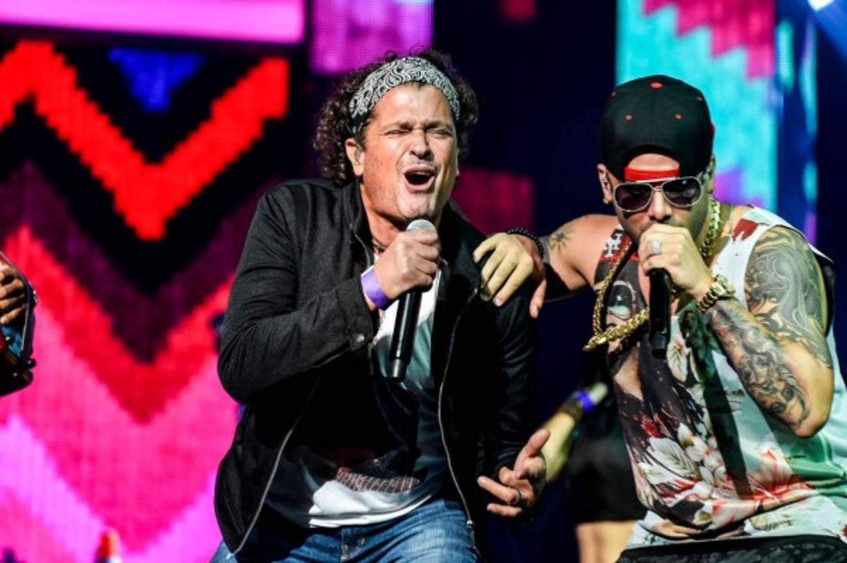 Carlos Vives y Wisin.