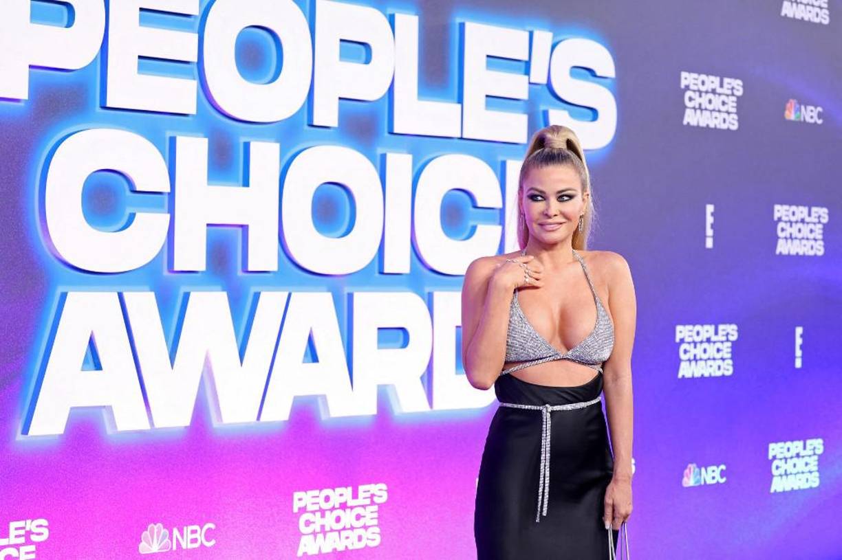 <b>Carmen Electra.</b> Con un sujetador brillante estilo bikini de Alexander Wang y una falda de seda, la actriz y modelo asistió a la noche de gala con un traje firmado por Alexander Wang.