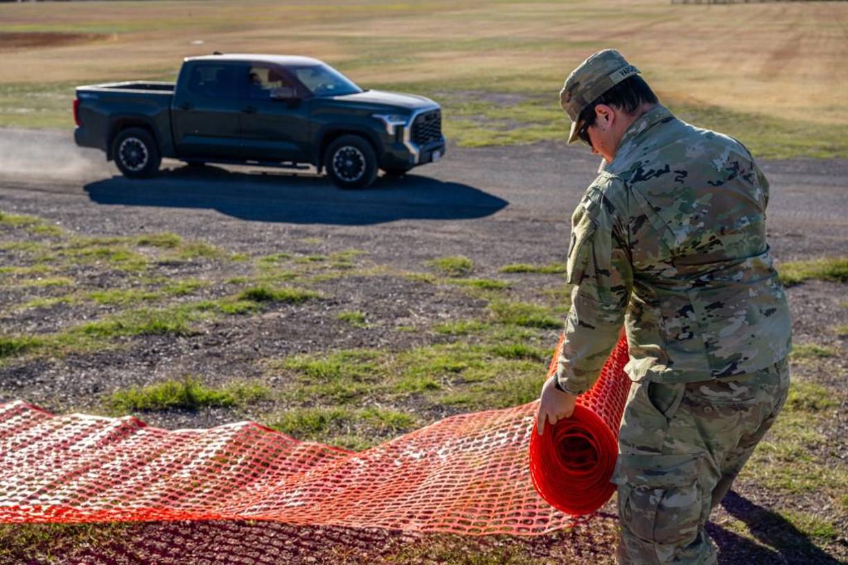  También instaló una polémica barrera de boyas en un tramo del río Bravo que separa la frontera entre Texas y México, e impulsó una ley para criminalizar a los migrantes que cruzan de forma irregular la frontera, ambas medidas muy criticadas por el presidente de México, Andrés Manuel López Obrador. 