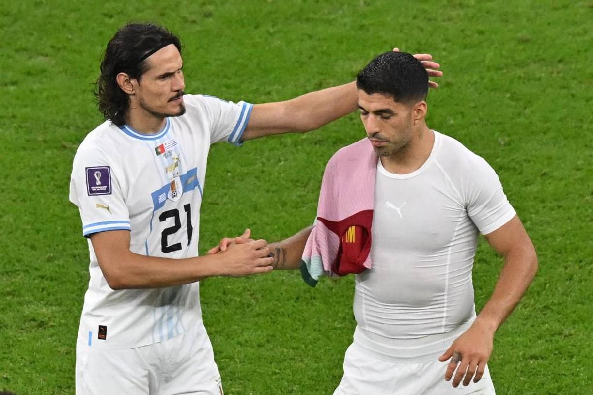 Luis Suárez y Cavani tras el final del juego.