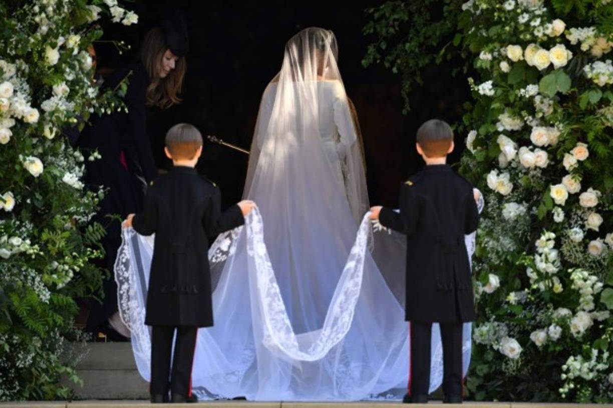 La actriz estadounidense Meghan Markle llega a la ceremonia nupcial para casarse con el príncipe Harry, Duque de Sussex, de Gran Bretaña, en la Capilla de San Jorge, en el Castillo de Windsor, en Windsor, el 19 de mayo de 2018.<br/>Ben STANSALL / PISCINA / AFP