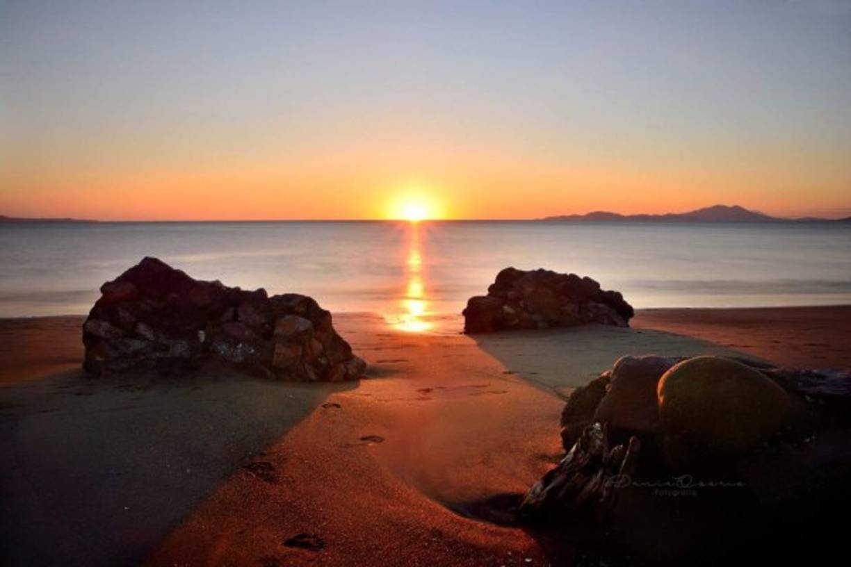 Uno de los regalos más bellos que ofrece la zona del golfo son sus atardeceres tal como este en la Playa El Edén en Marcovia, Choluteca. Foto de Dunia Osorio Fotografía http://on.fb.me/1RnOZCL