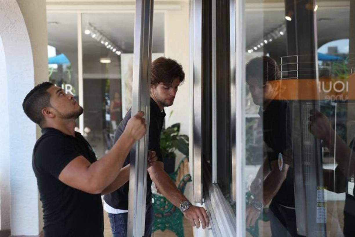 LAKE BUENA VISTA, FL - JULY 08: Crowds walk through Disney Springs shopping and dining complex at Walt Disney World on July 8, 2020 in Lake Buena Vista, Florida. The theme park is scheduled to reopen on Saturday despite a surge in new Covid-19 infections throughout Florida, including the central part of the state where Orlando is located. Octavio Jones/Getty Images/AFP<br/><br/>== FOR NEWSPAPERS, INTERNET, TELCOS & TELEVISION USE ONLY ==<br/><br/>
