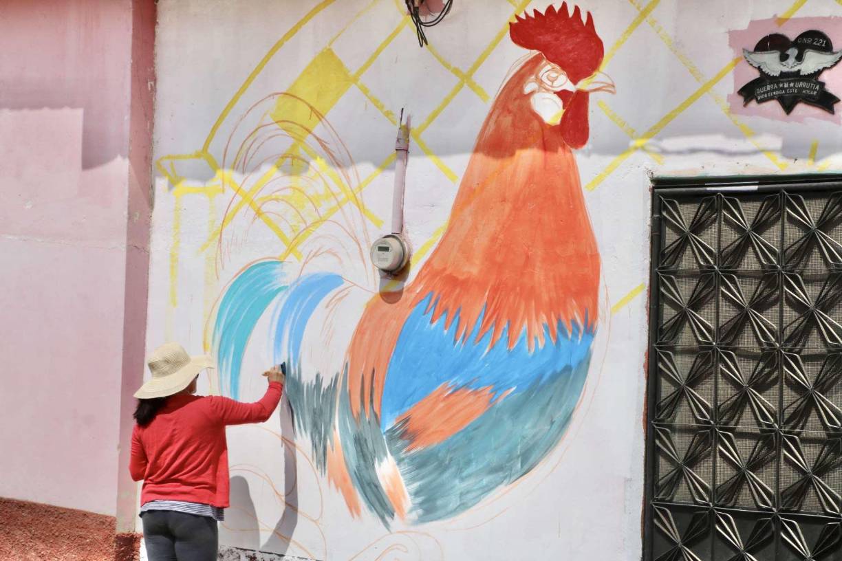 Durante los primeros días de su visita, los artistas aprovecharon para fotografiar la cultura, tradiciones y gente de Dulce Nombre, las que ya se notan en los vistosos murales