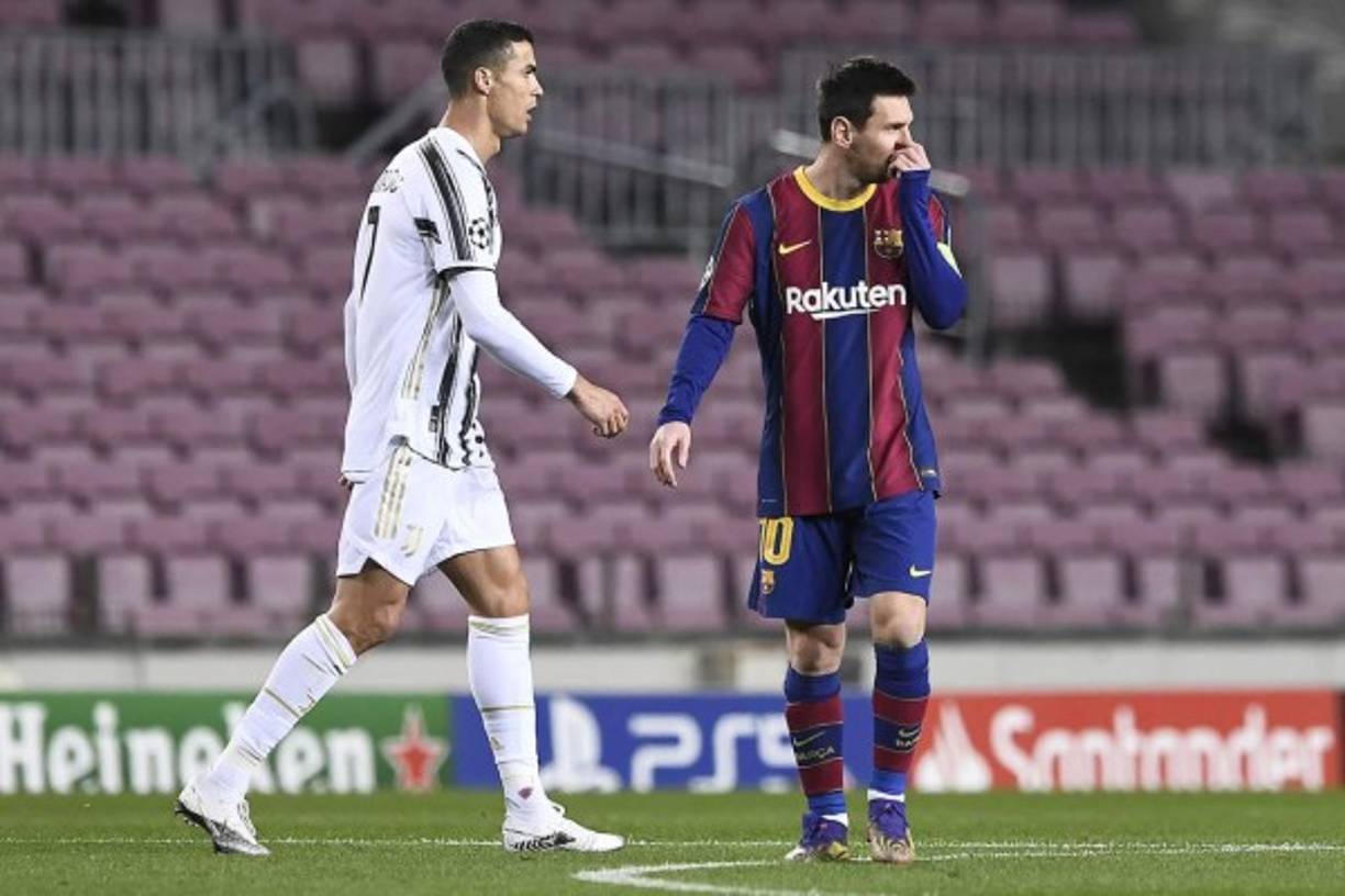 Cristiano Ronaldo y Lionel Messi durante un lance del partido.