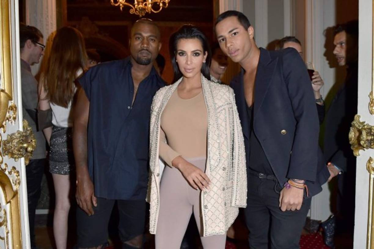 (FILES) In this file photo Business woman/media personality Kim Kardashian arrives for the 45th annual E! People's Choice Awards at Barker Hangar in Santa Monica, California, on November 10, 2019. - Cooped up like many of us, movie stars, politicians and reality show types eager to hold onto their fans are turning to podcasts to get through the pandemic, converting their homes -- even a bathroom in one case -- into makeshift recording studios. (Photo by Jean-Baptiste Lacroix / AFP)