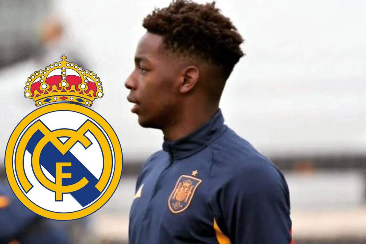 El Real Madrid se ha olvidado del ‘pacto de no agresión’ con el Atlético de Madrid y le ha ‘robado’ seis jugadores de la cantera rojiblanca. El defensa internacional español Ariel Nkhoge (imagen) es el nombre más llamativo. Los hermanos Alameda, Nacho y Jaime, el central Noé Pérez, Iñigo Fresco y el lateral Córcova del cadete B, son otras incorporaciones del club blando en este mercado de verano. Estos fichajes han creado una fuerte tensión entre ambos clubes, con el Atleti tratando de detener esa fuga de talentos.