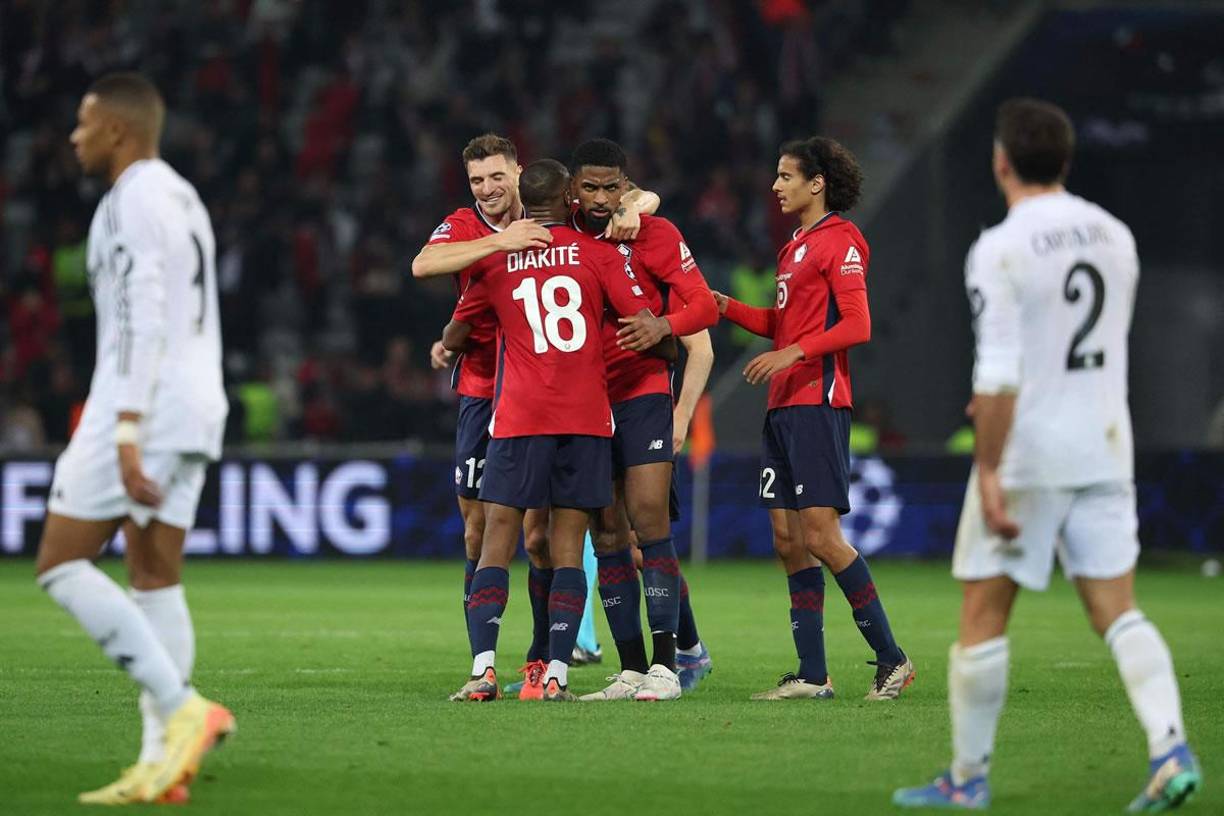 Los jugadores del Lille celebrando su triunfo histórico contra el Real Madrid en la Champions League.