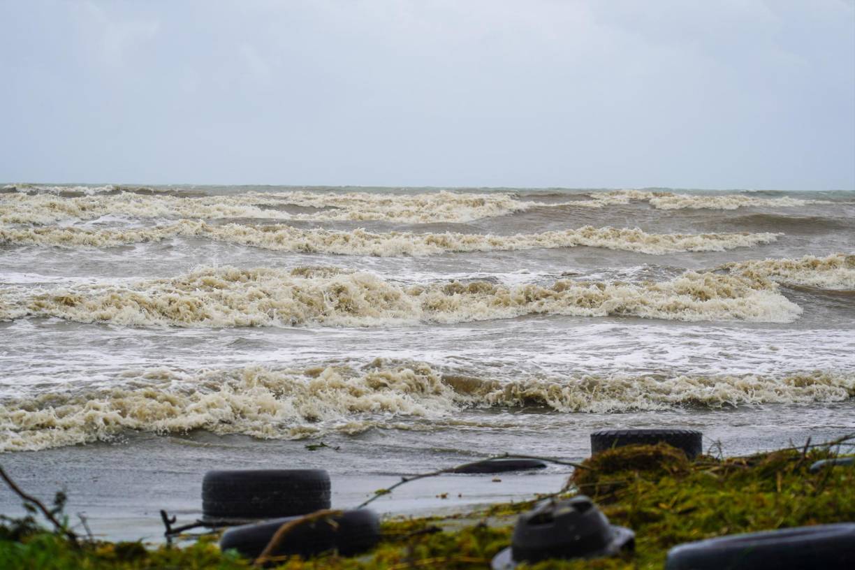 High winds, rain and storm surge after Tropical Storm Ernesto hit Puerto Rico, on August 14, 2024 in Humacao, Puerto Rico. Ernesto grew into a hurricane Wednesday, US forecasters said, after leaving more than 600,000 customers without power in the US territory of Puerto Rico. (Photo by Jaydee Lee SERRANO / AFP)