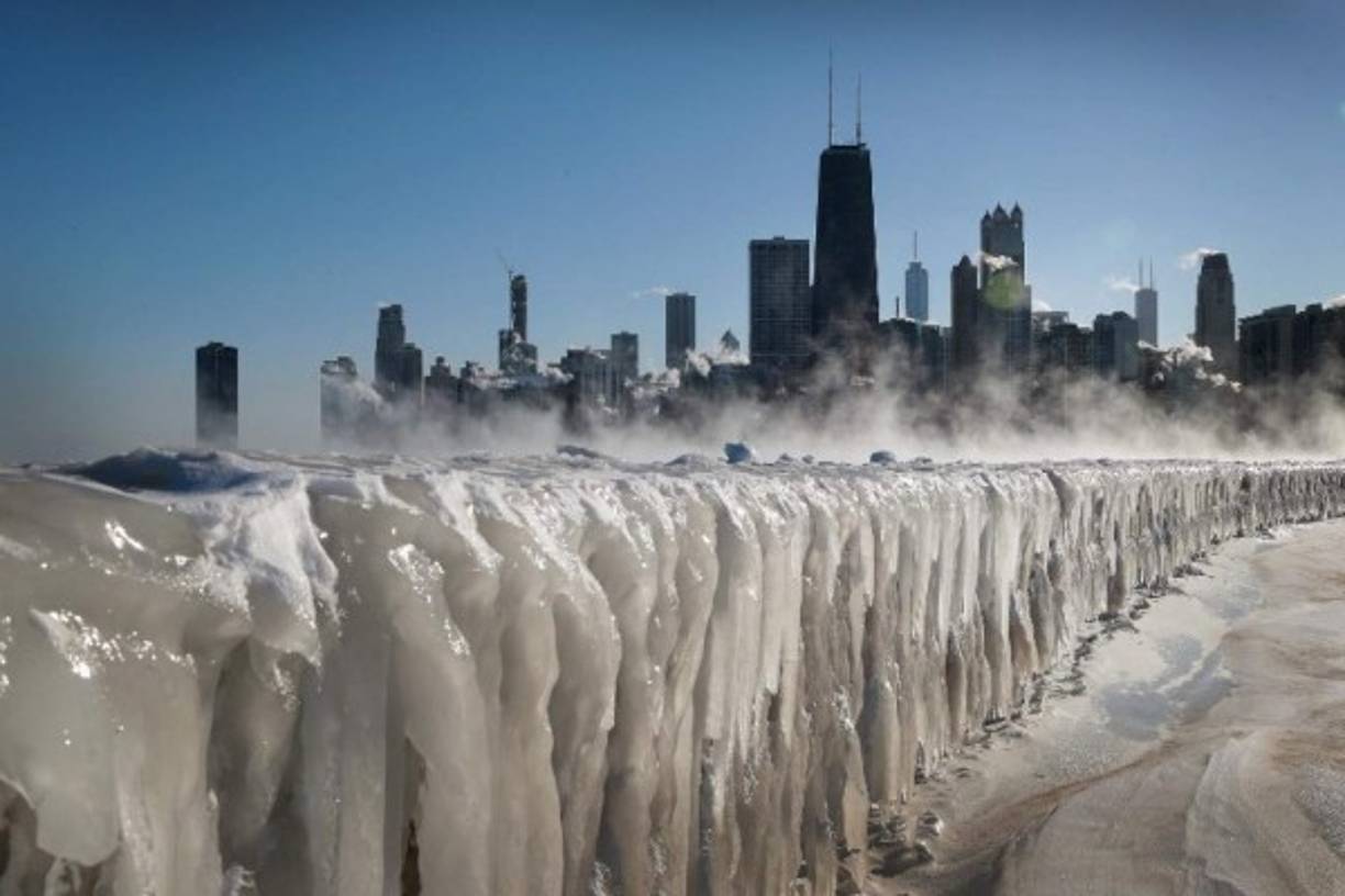 CHICAGO, ILLINOIS - JANUARY 30: Ice covers the Lake Michigan shoreline on January 30, 2019 in Chicago, Illinois. Businesses and schools have closed, Amtrak has suspended service into the city, more than a thousand flights have been cancelled and mail delivery has been suspended as the city copes with record-setting low temperatures. Scott Olson/Getty Images/AFP
