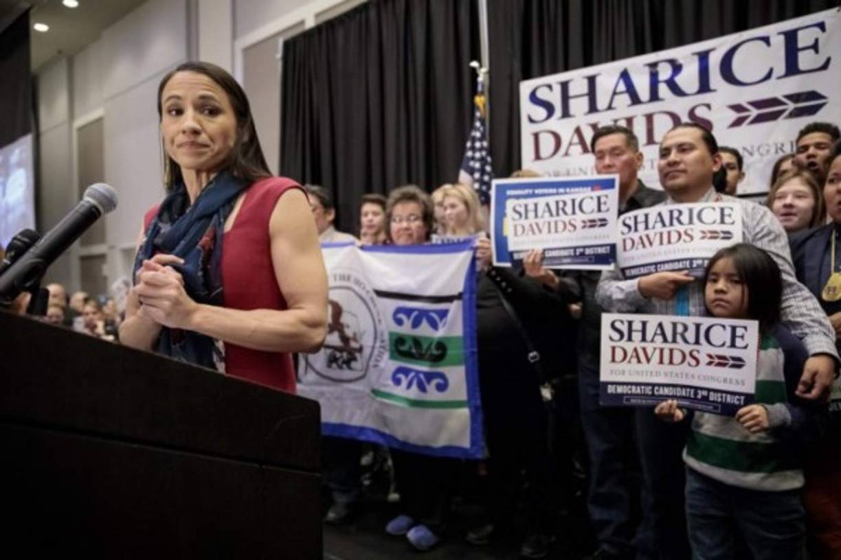 OLATHE, KS - NOVEMBER 06: Democratic candidate for Kansas' 3rd Congressional District Sharice Davids speaks to supporters during an election night party on November 6, 2018 in Olathe, Kansas. Davids defeated incumbent Republican Kevin Yoder. Whitney Curtis/Getty Images/AFP