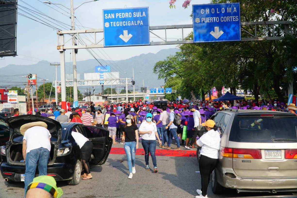 Marcha del Día del Trabajador en San Pedro Sula. Fotos: José Cantarero / La Prensa