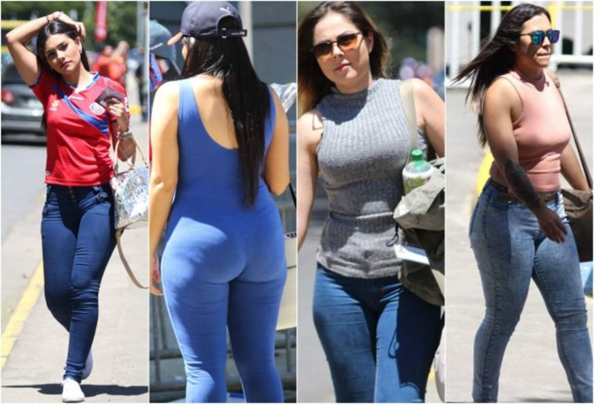 Argentina fans cheer with pictures of Argentina's forward Lionel Messi and Argentinian football legend Diego Maradona (R) ahead of a friendly football match between Spain and Argentina at the Wanda Metropolitano Stadium in Madrid on March 27, 2018. / AFP PHOTO / GABRIEL BOUYS